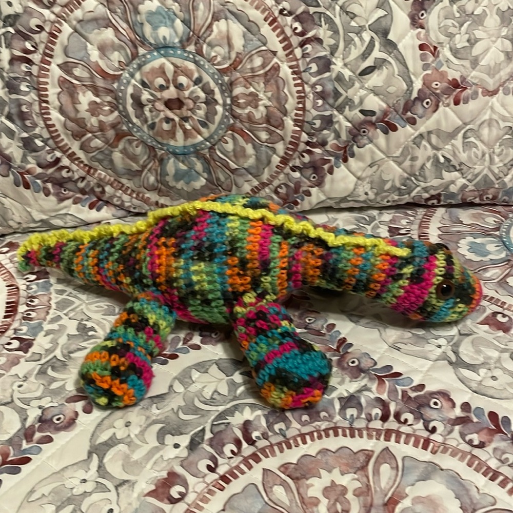 Crochet multi colored-Dinosaur Handmade Plush Toy. Has hard plastic eyes